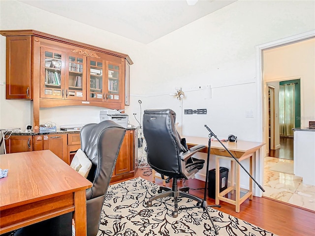 office space with light wood-type flooring