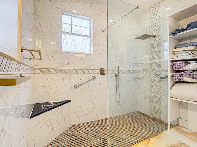 bathroom featuring a tile shower and toilet