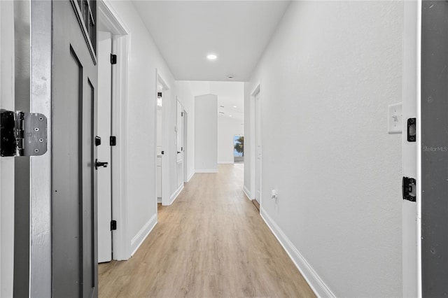 hall featuring light hardwood / wood-style floors