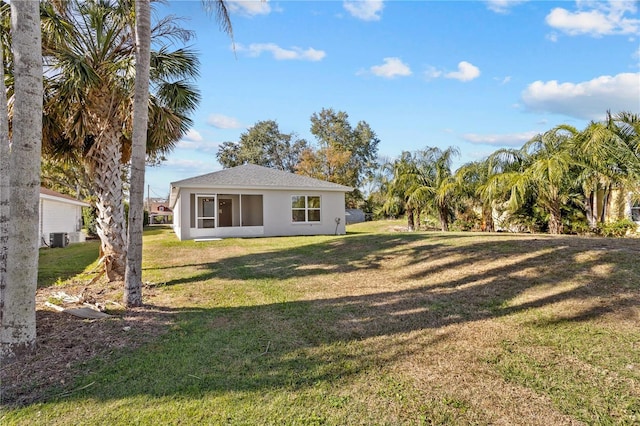 view of yard featuring central AC