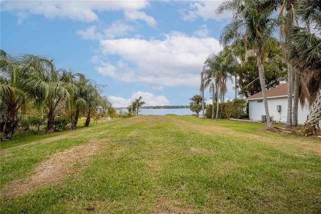 view of yard with a water view