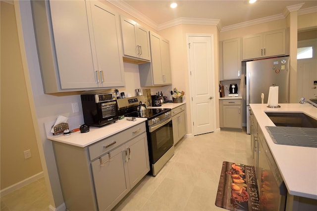 kitchen with gray cabinetry, stainless steel appliances, crown molding, sink, and light tile patterned floors