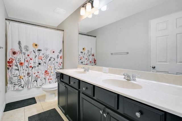 full bathroom with tile patterned flooring, vanity, toilet, and shower / bathtub combination with curtain