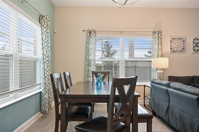 dining room featuring light tile patterned floors