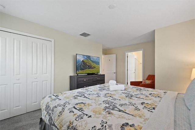 bedroom featuring carpet and a closet