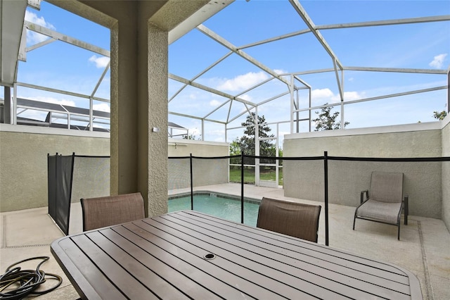 view of patio / terrace with glass enclosure