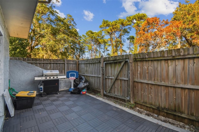 view of patio with a grill