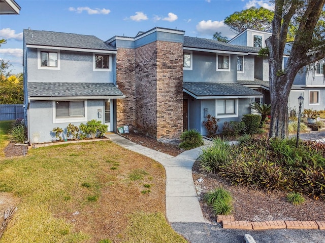 front of property featuring a front yard