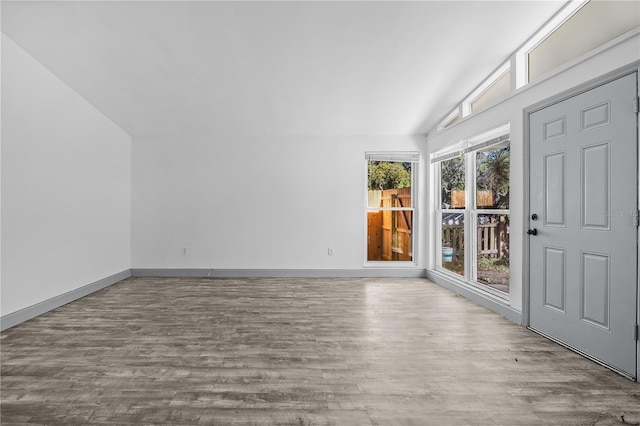 interior space featuring vaulted ceiling