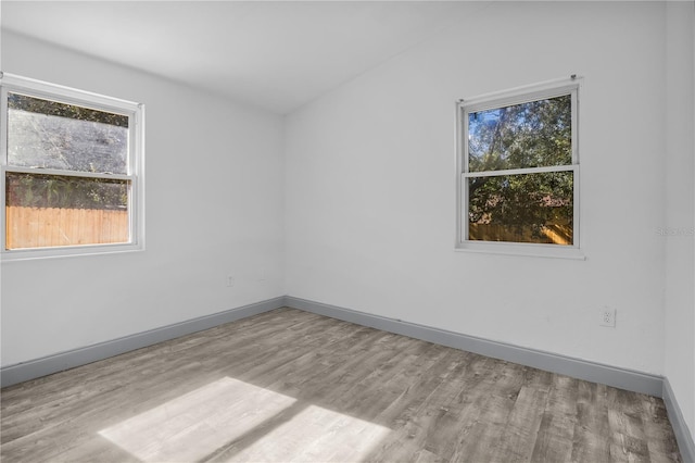 empty room with light wood-type flooring