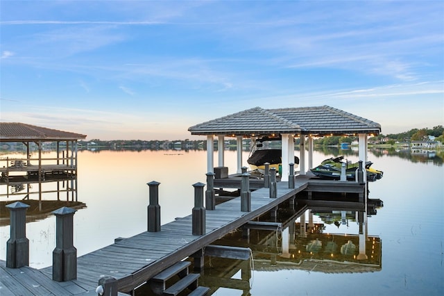 dock area with a water view