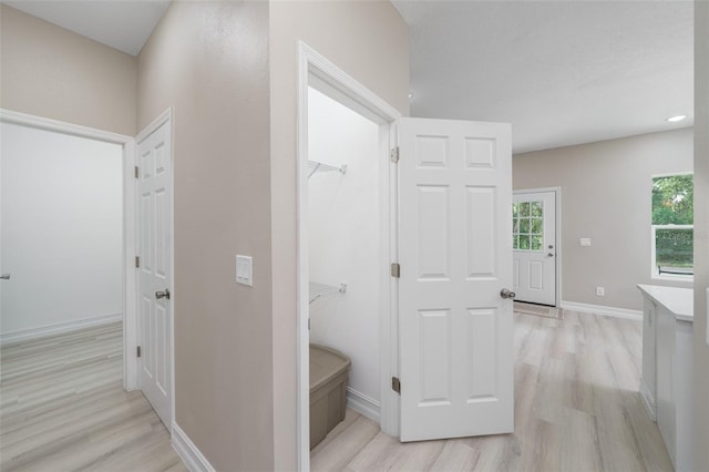 hall featuring light hardwood / wood-style flooring