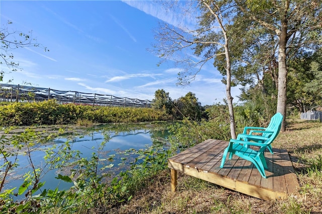 dock area featuring a water view