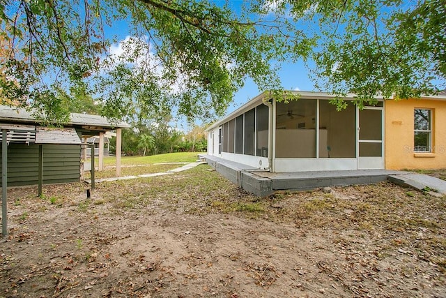 view of yard featuring a sunroom