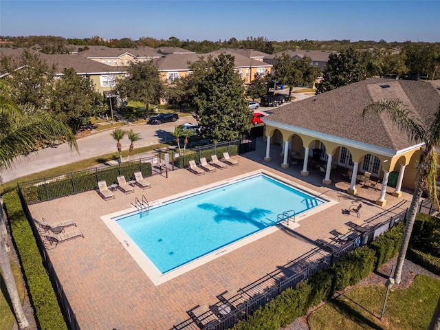 view of swimming pool featuring a patio area