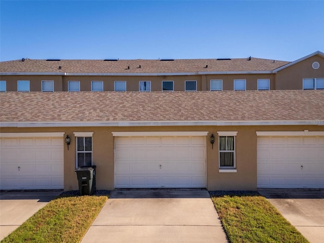 13228 Daniels Landing Cir, Winter Garden, FL 34787 - view of front of property featuring stucco siding and a shingled roof