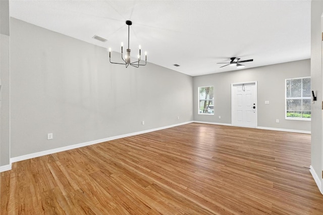 13228 Daniels Landing Cir, Winter Garden, FL 34787 - unfurnished room featuring light wood-style flooring, a ceiling fan, and a chandelier