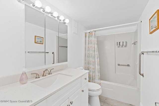 full bathroom featuring shower / tub combo, vanity, and toilet