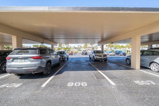 view of car parking with a carport