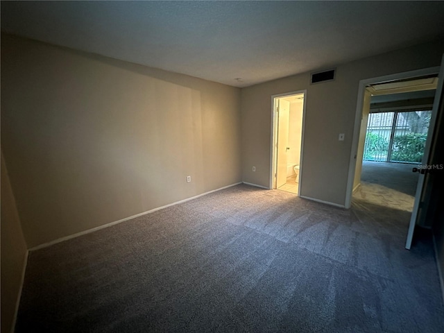 unfurnished bedroom with carpet flooring