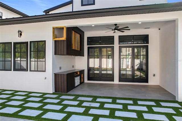 exterior space featuring ceiling fan, a patio area, and french doors