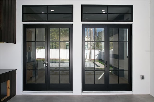 entryway featuring french doors