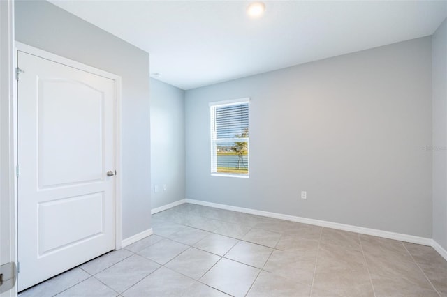 view of tiled spare room