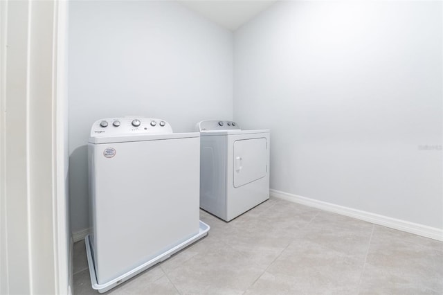 laundry room with independent washer and dryer