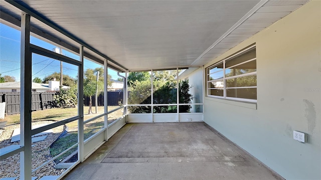 unfurnished sunroom featuring plenty of natural light