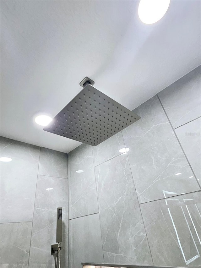 room details with a tile shower