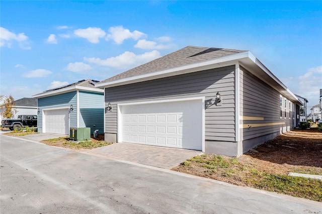 view of home's exterior with a garage