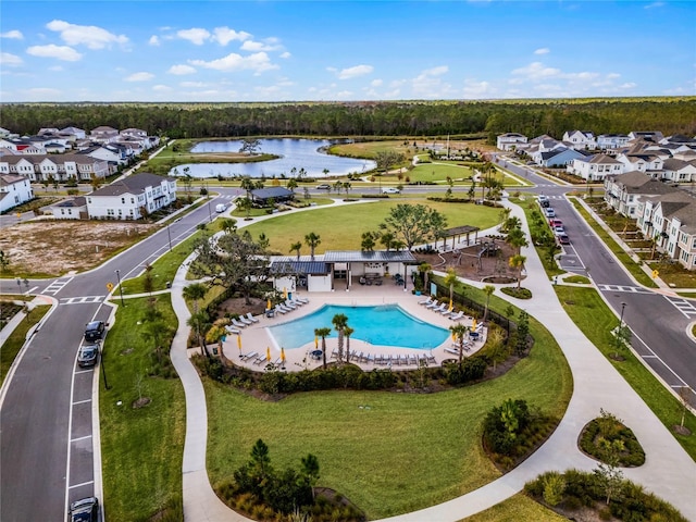 birds eye view of property featuring a water view