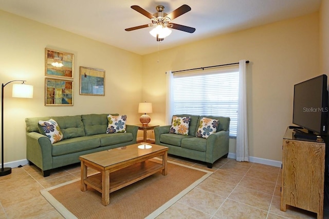 tiled living room featuring ceiling fan