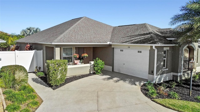 ranch-style house featuring a garage