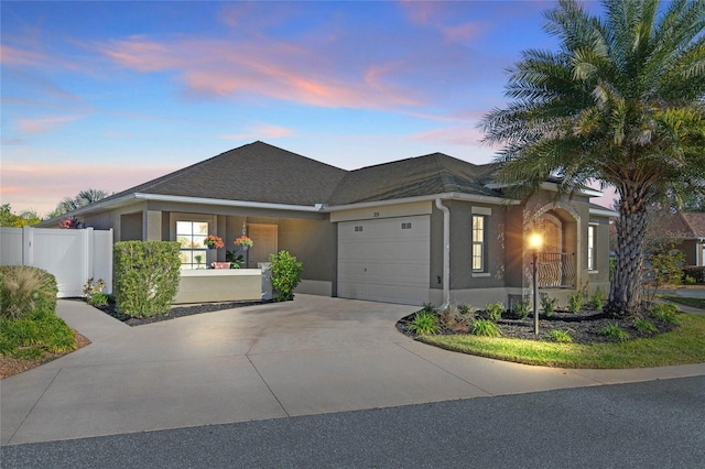 view of front of property featuring a garage