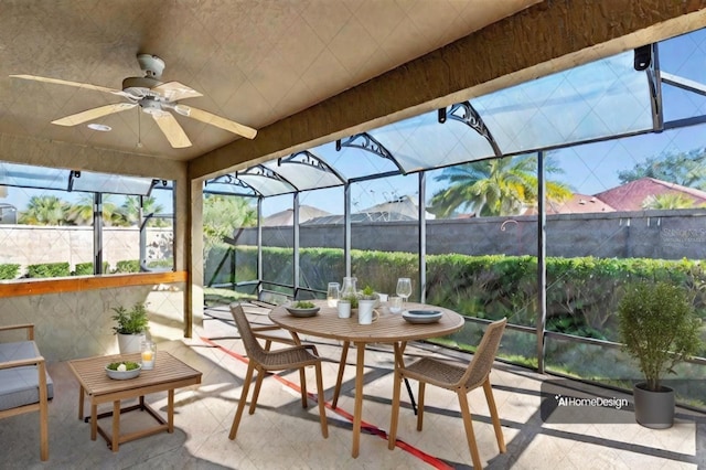 sunroom with ceiling fan