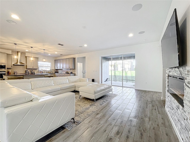 4408 Renly Ln, Clermont, FL 34711 - living area featuring healthy amount of natural light, recessed lighting, and light wood-style floors