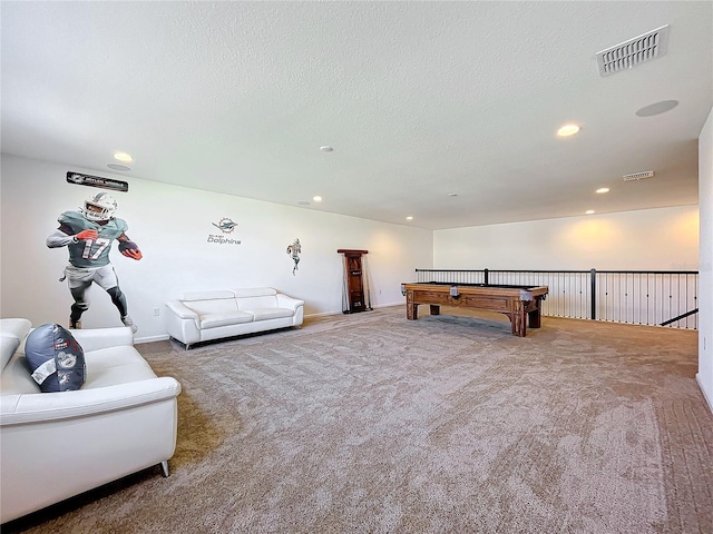 recreation room featuring carpet flooring, a textured ceiling, and pool table