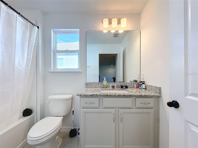 full bathroom with vanity, toilet, and shower / bath combo with shower curtain