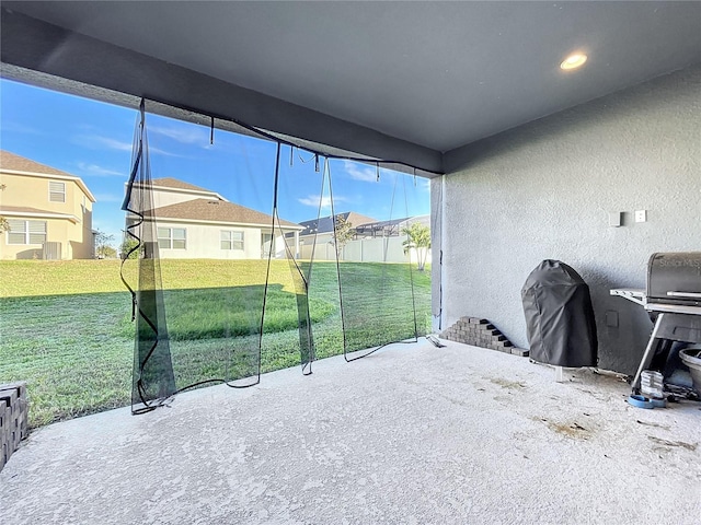 4408 Renly Ln, Clermont, FL 34711 - unfurnished sunroom featuring a residential view