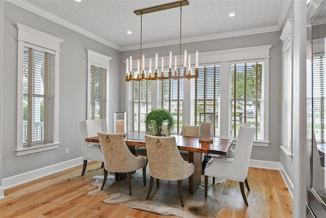 dining area with baseboards, light wood finished floors, recessed lighting, and crown molding