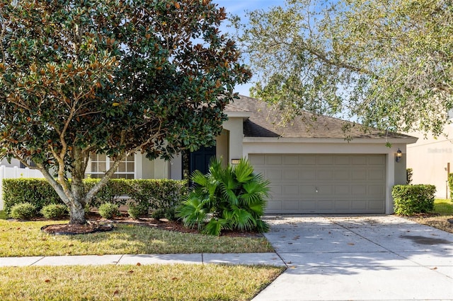 obstructed view of property featuring a garage