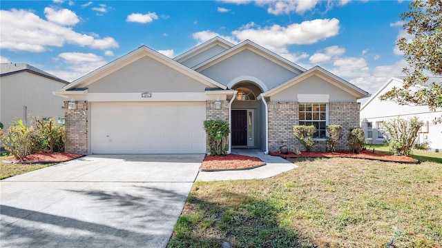 single story home with a garage and a front lawn