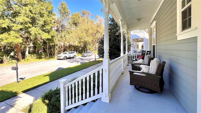 balcony featuring covered porch