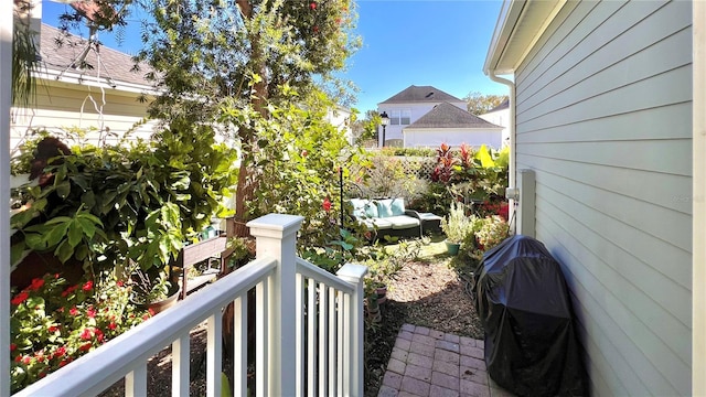 view of yard featuring a balcony