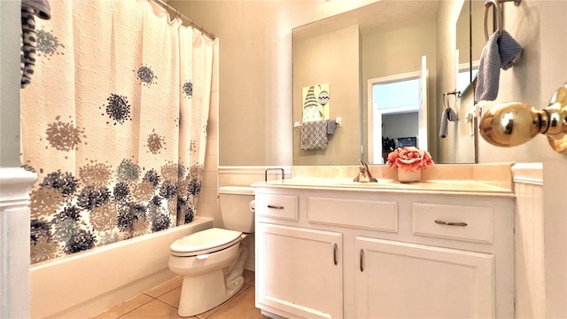 full bathroom with tile patterned flooring, vanity, shower / bath combination with curtain, and toilet