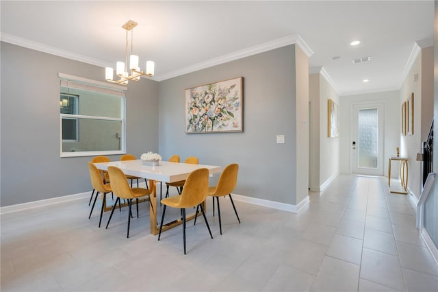 dining area with crown molding and a chandelier