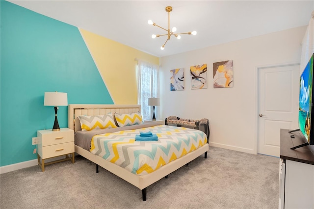 carpeted bedroom with a notable chandelier