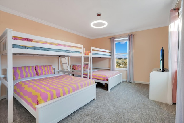 carpeted bedroom with ornamental molding