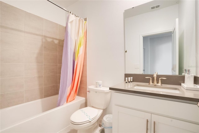 full bathroom with vanity, toilet, and shower / bath combo with shower curtain